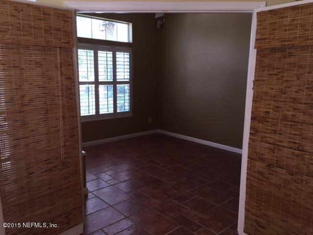 205 Cedar Ridge Circle St. Augustine, FL 32080 - Photo 6 of 29 a view of an empty room with a window