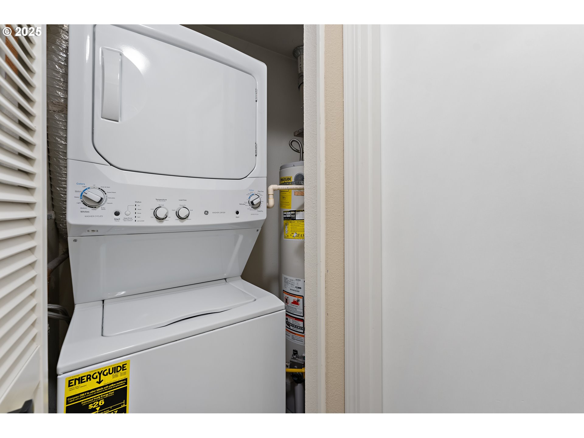 15514 Southwest 114th Court, Unit 61 Tigard, OR 97224 - Photo 22 of 35 a utility room with dryer and washer