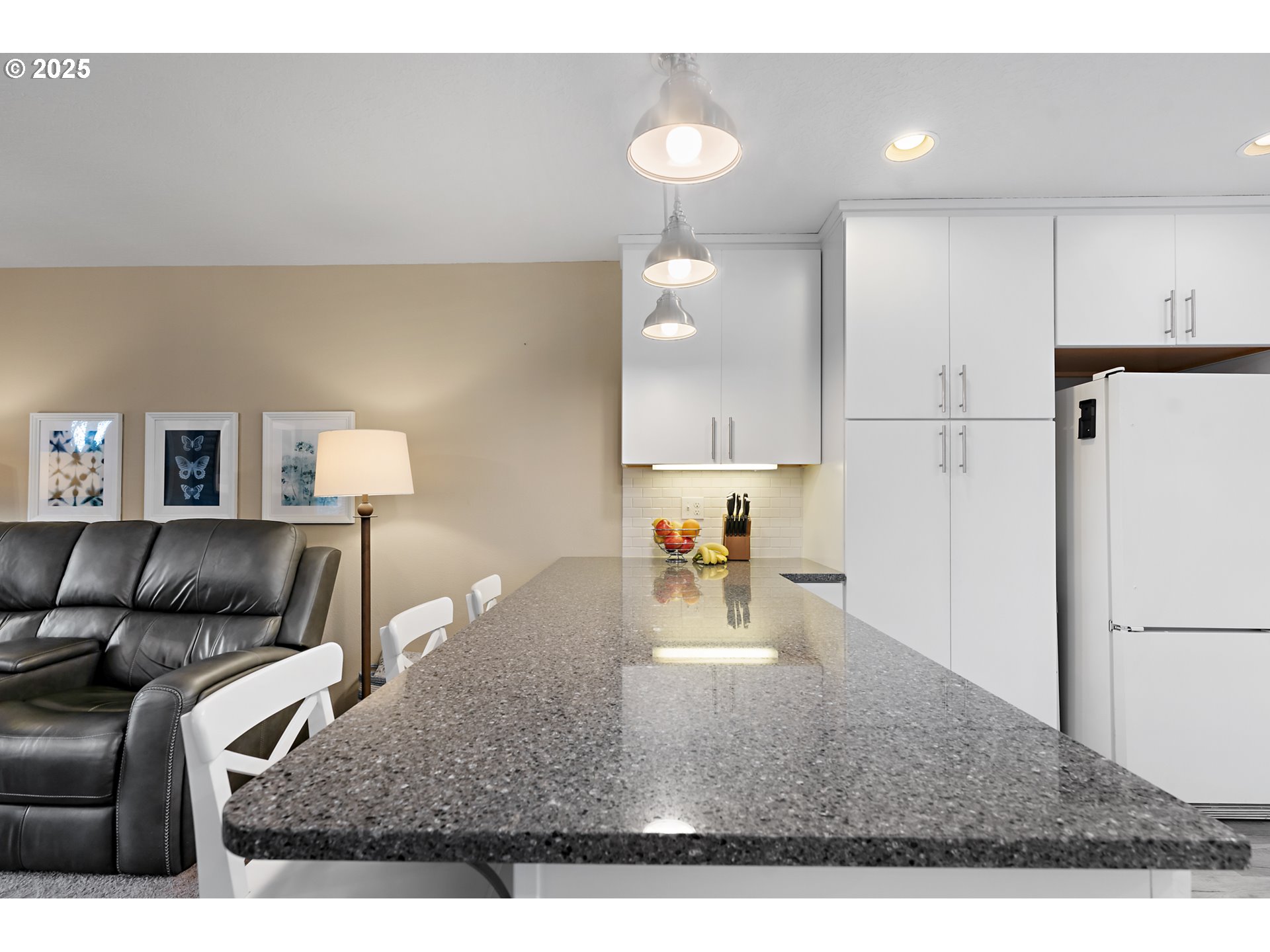 15514 Southwest 114th Court, Unit 61 Tigard, OR 97224 - Photo 10 of 35 a living room with furniture and a table