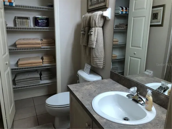 a bathroom with a sink and a toilet