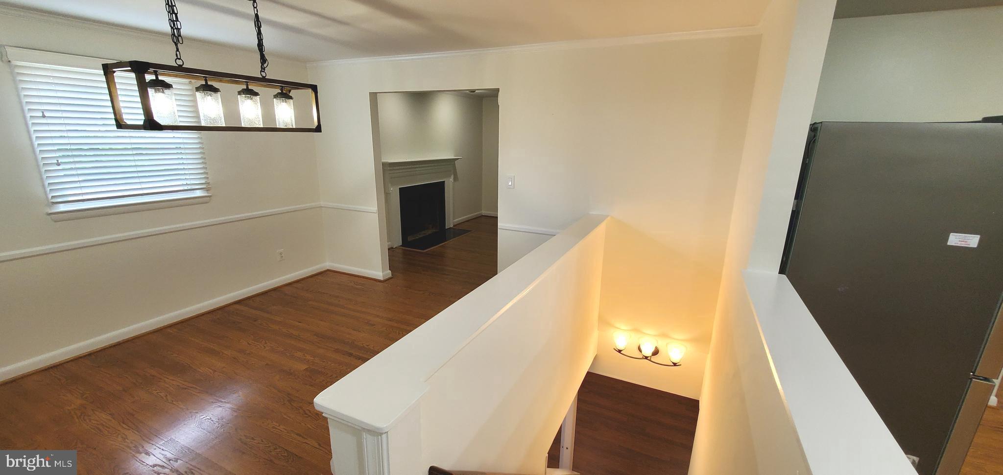 1533 Sinclair Drive McLean, VA 22101 - Photo 20 of 42 Staircase to lower level by the dining room & Kit.