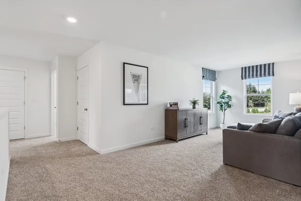 a living room with furniture and a couch