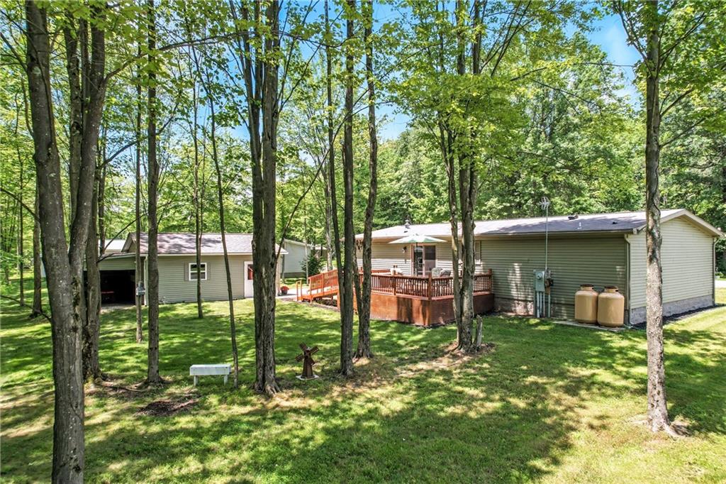73 South Summit Road, Unit 503 Greenville, PA 16125 - Photo 33 of 36 a backyard of a house with lots of green space