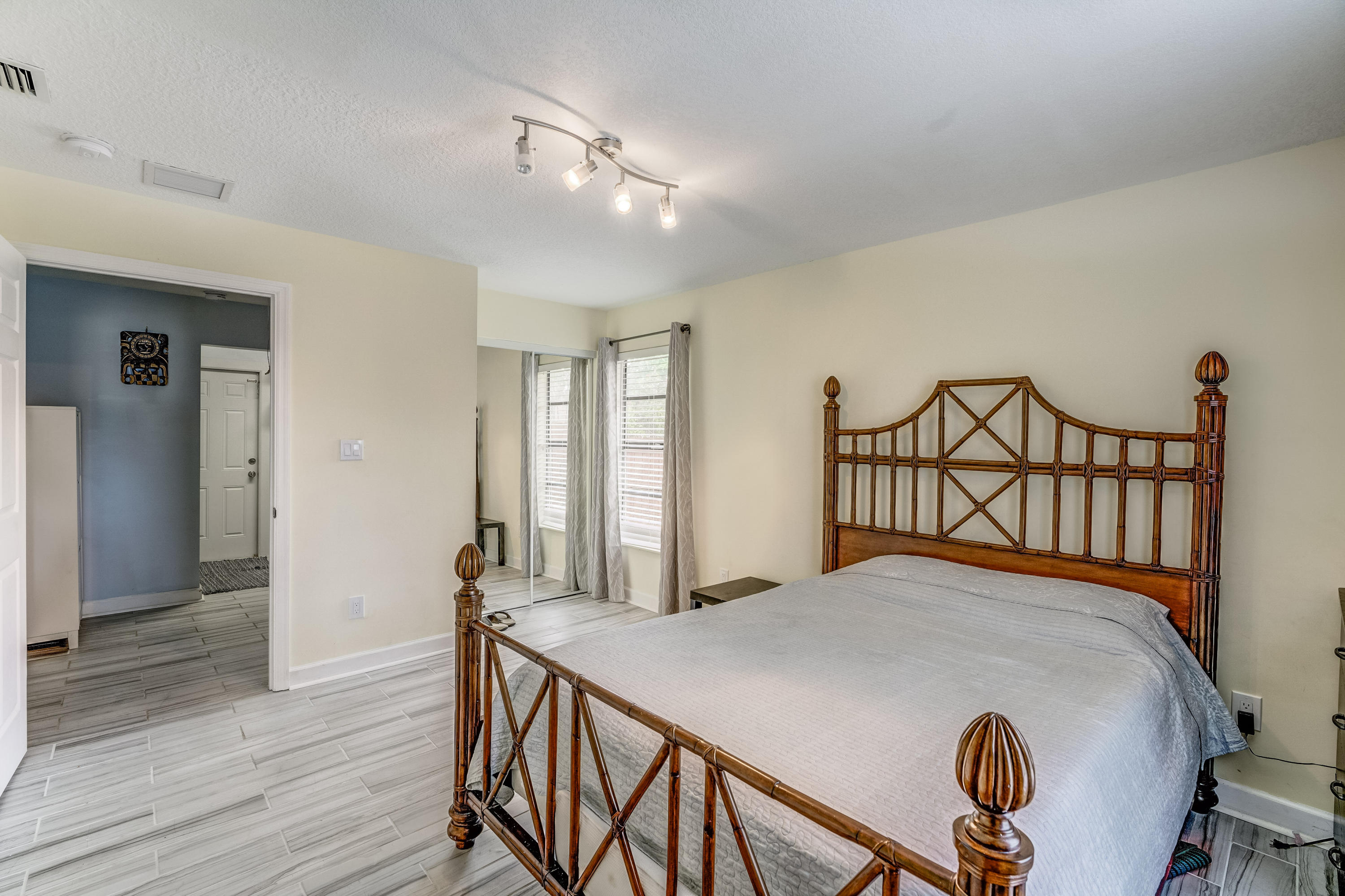 6120 Wolfe Street Jupiter, FL 33458 - Photo 22 of 55 Guest Bedroom and bamboo floors