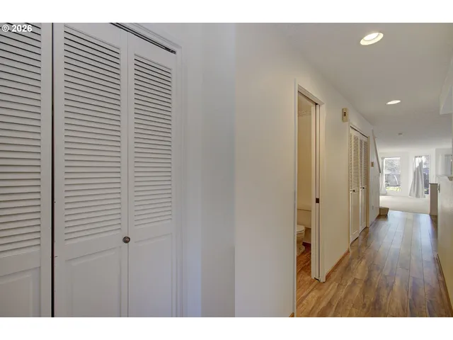 a view of hallway with a large window