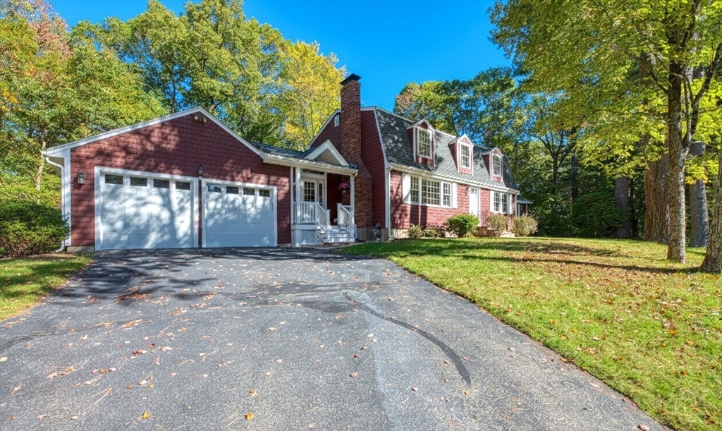 2 Beaver Brook Road Sharon, MA 02067 - Photo 2 of 9 a front view of a house with garden