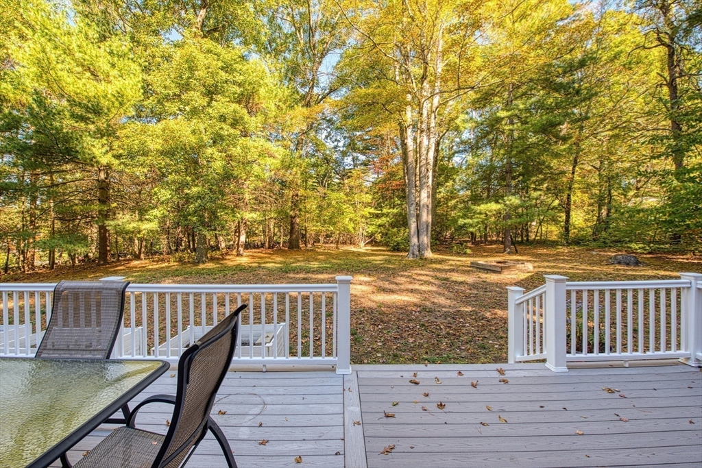 2 Beaver Brook Road Sharon, MA 02067 - Photo 4 of 9 a view of a patio with wooden floor and fence