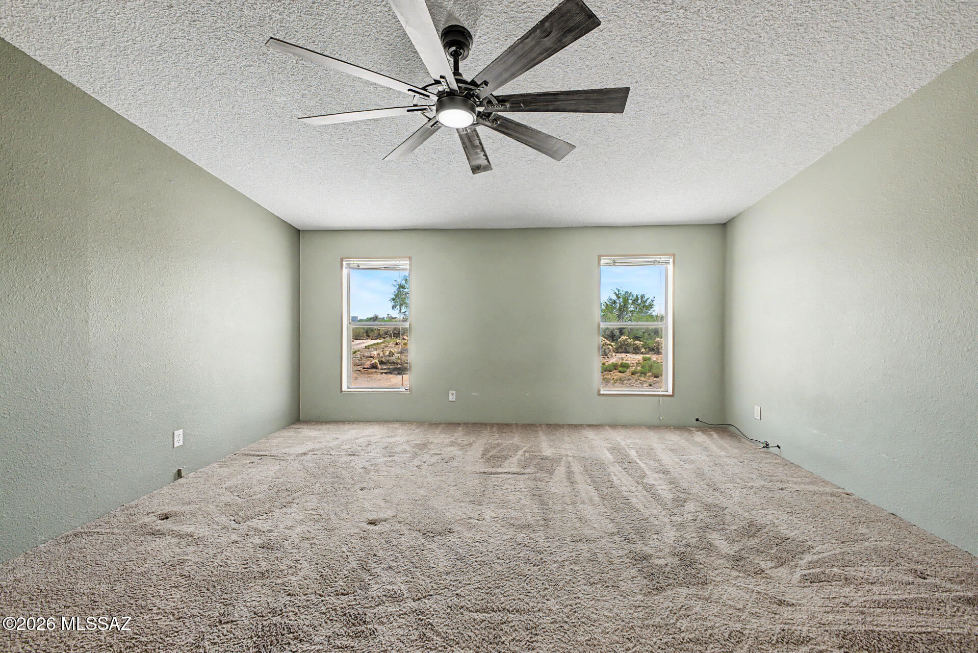 1911 West Thunder Road Vail, AZ 85641 - Photo 17 of 38 a view of an empty room with a window