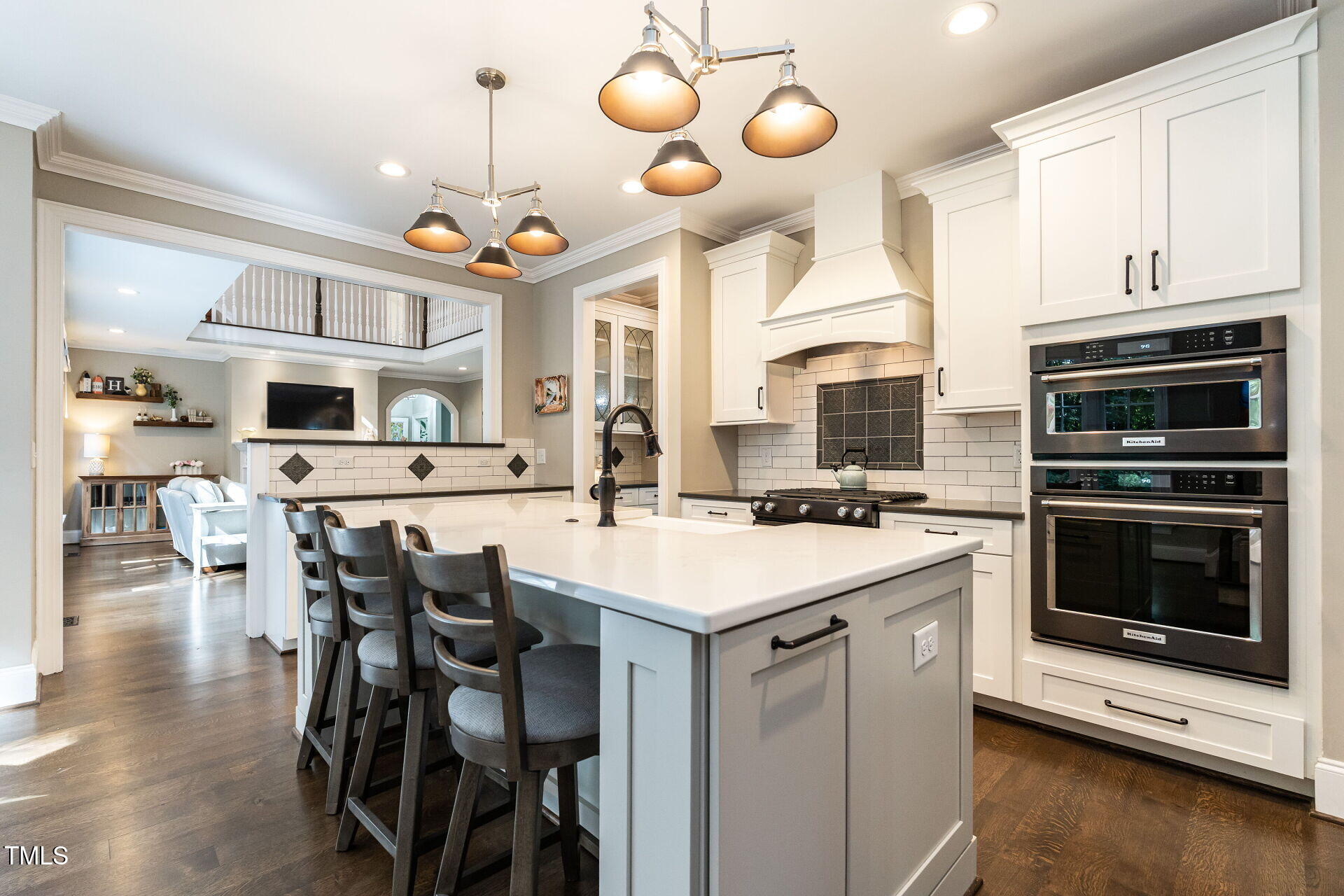 1228 Dorleath Court Raleigh, NC 27614 - Photo 13 of 47 a kitchen with a table and chairs in it