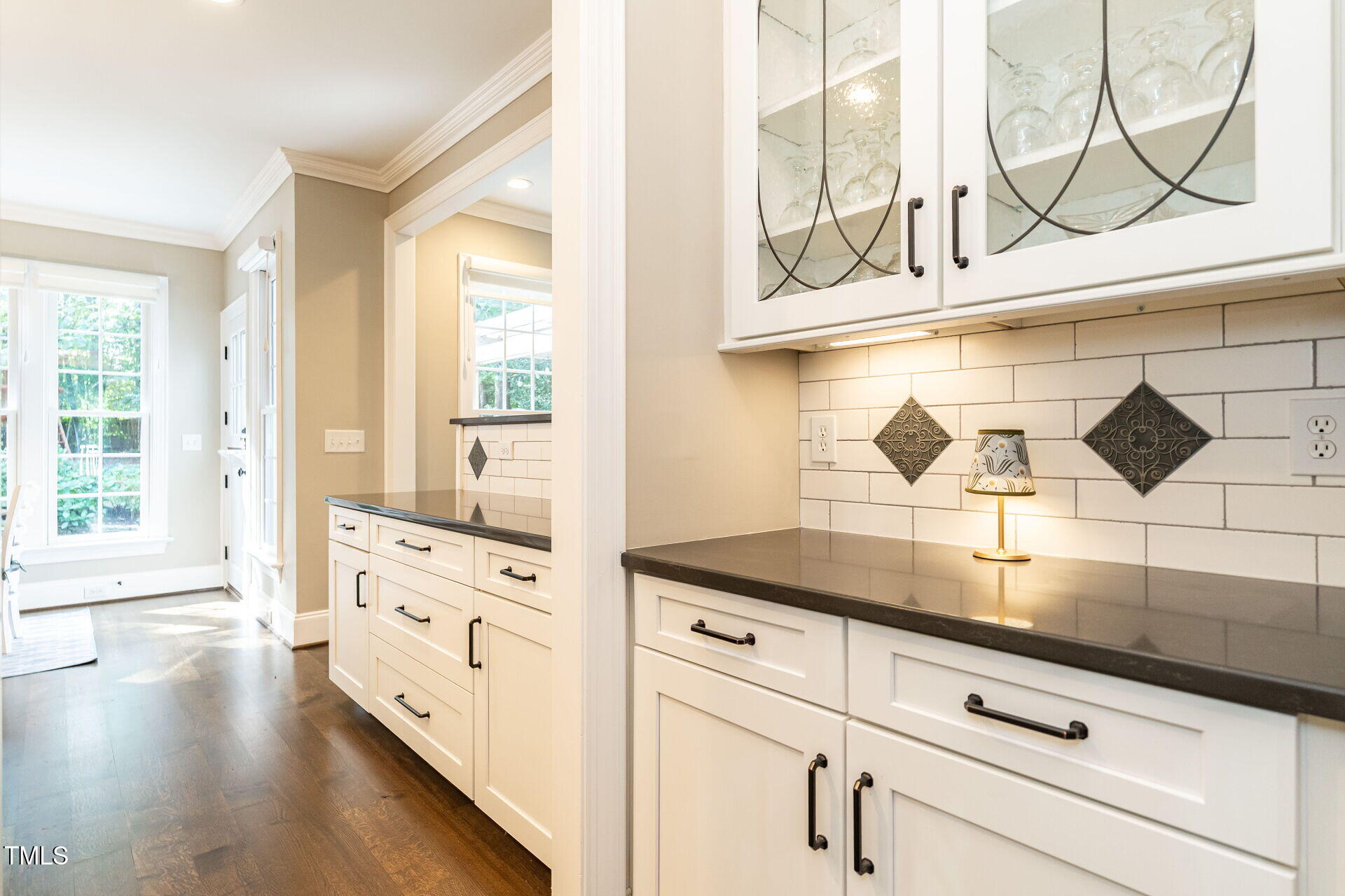 1228 Dorleath Court Raleigh, NC 27614 - Photo 15 of 47 a kitchen with granite countertop white cabinets and white appliances