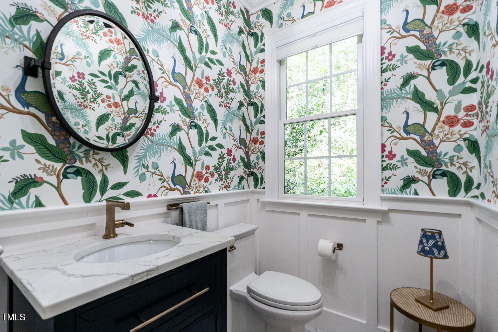 1228 Dorleath Court Raleigh, NC 27614 - Photo 21 of 47 a bathroom with a granite countertop sink and a mirror