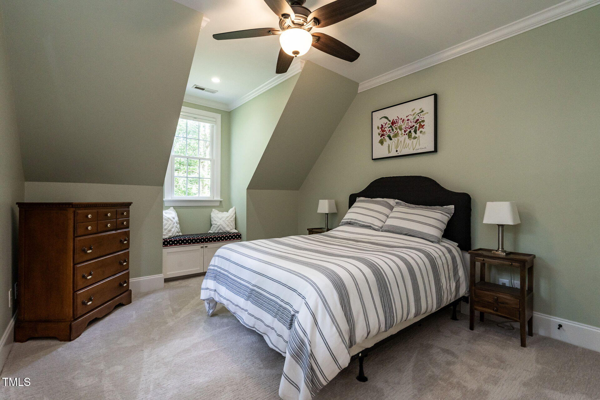 1228 Dorleath Court Raleigh, NC 27614 - Photo 32 of 47 a bedroom with a bed and a chandelier