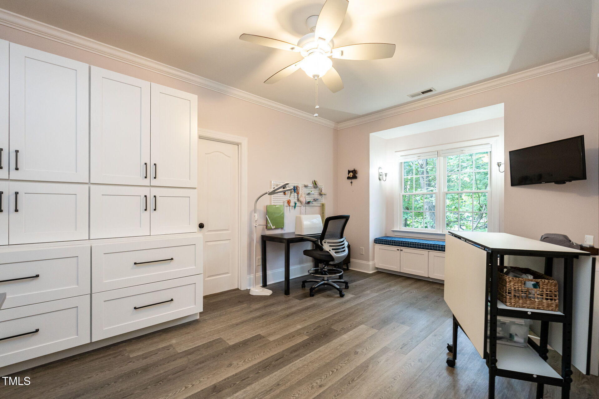 1228 Dorleath Court Raleigh, NC 27614 - Photo 34 of 47 a view of a workspace with furniture and a window