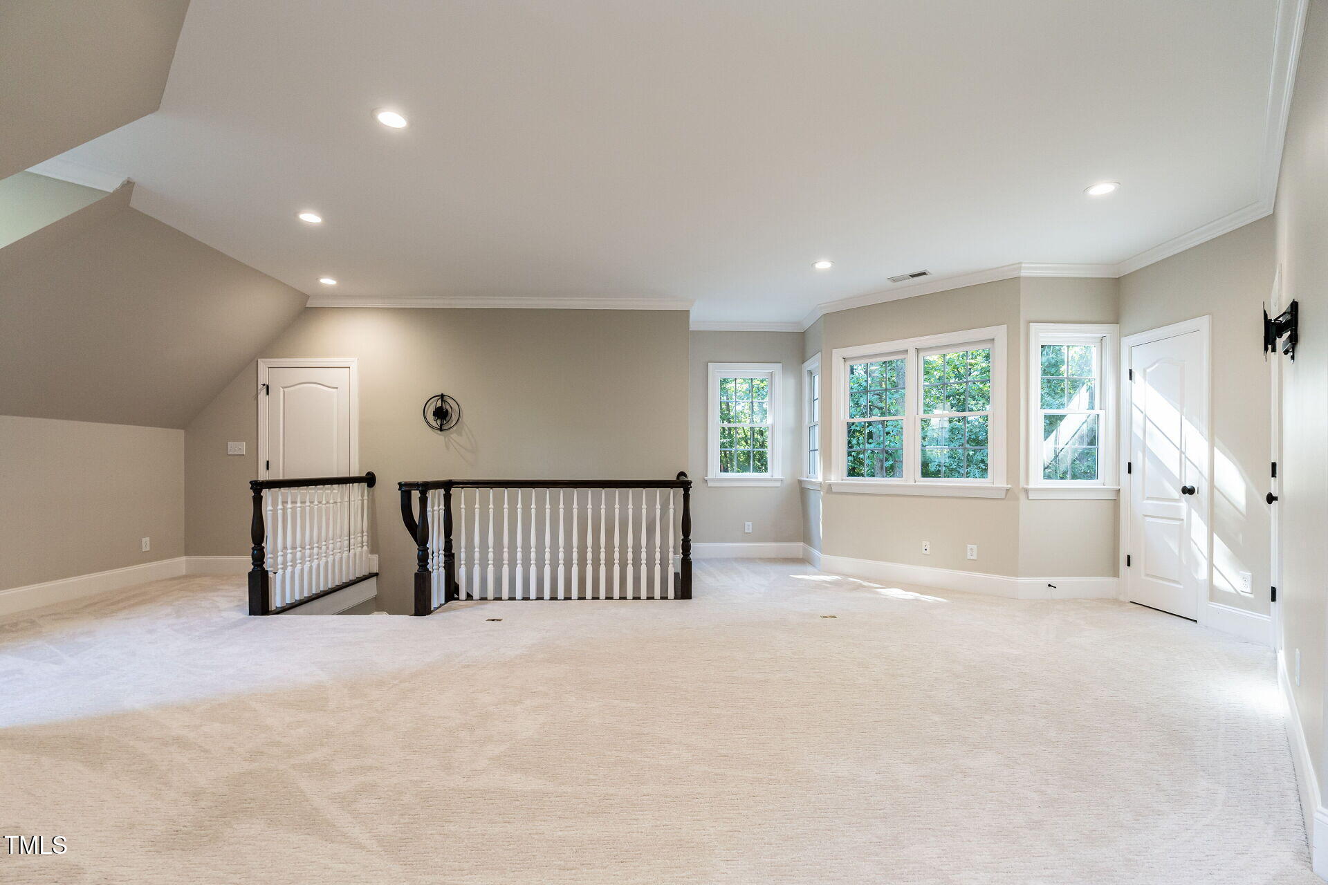 1228 Dorleath Court Raleigh, NC 27614 - Photo 35 of 47 an empty room with windows