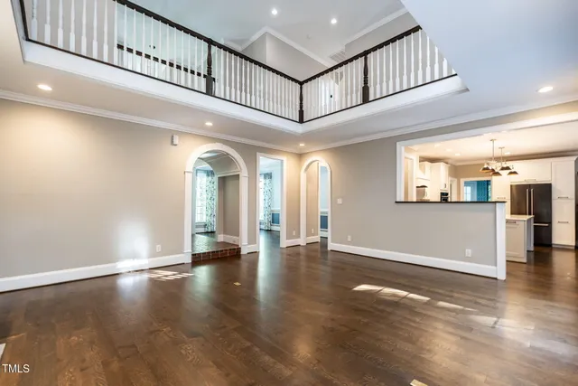 a view of an entryway with wooden floor