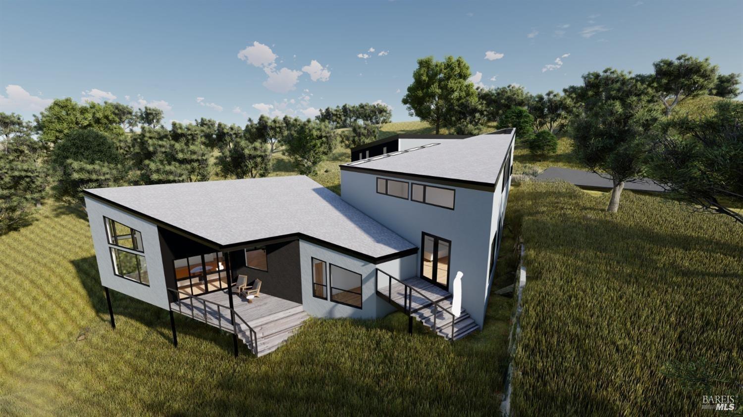 an aerial view of a house with swimming pool and garden