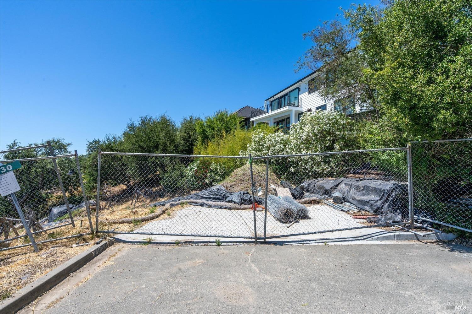1930 Viewpointe Circle Santa Rosa, CA 95403 - Photo 20 of 21 a view of a wooden fence with a bench in patio
