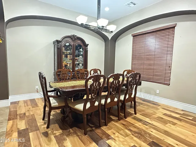 a view of a dining room with furniture