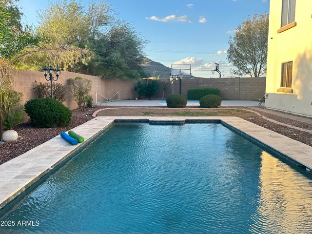 a view of a terrace with a lake view