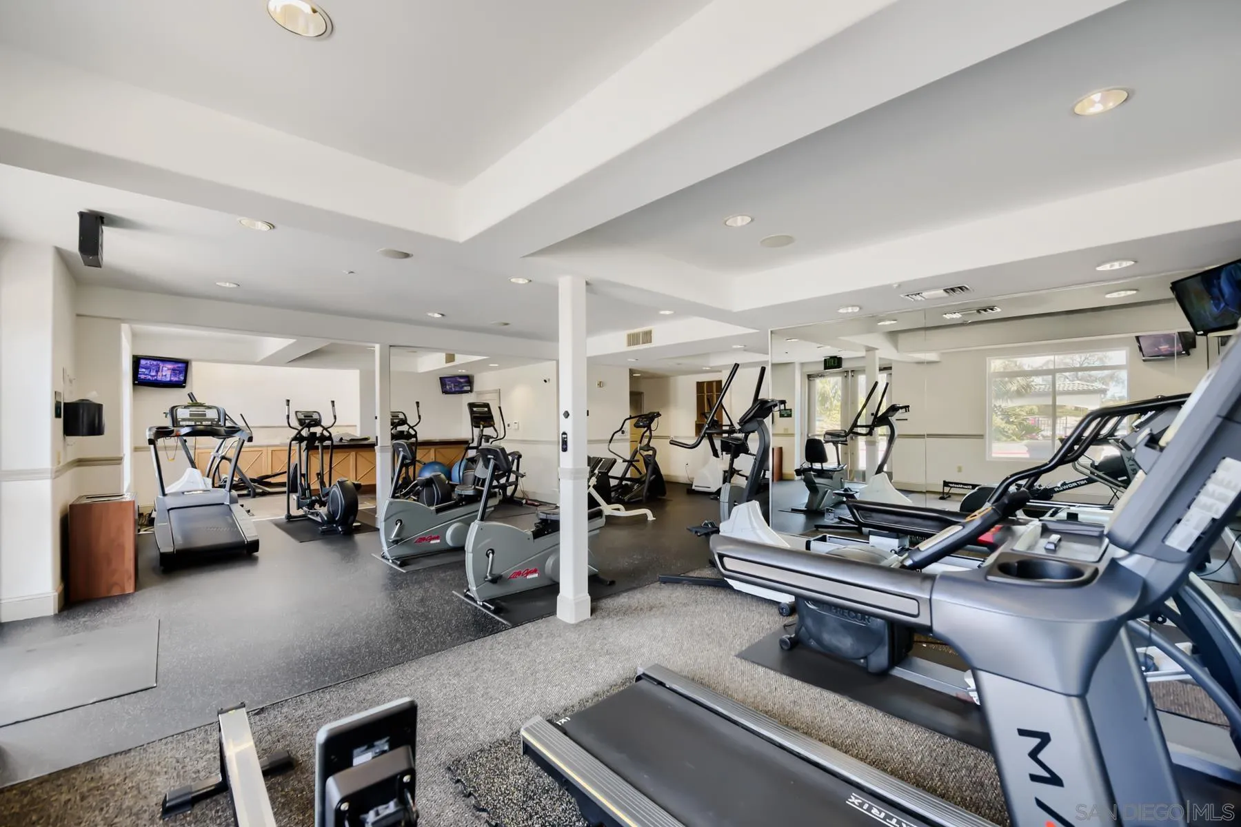 9293 Regents Road, Unit C108 La Jolla, CA 92037 - Photo 9 of 14 a view of a room with gym equipment