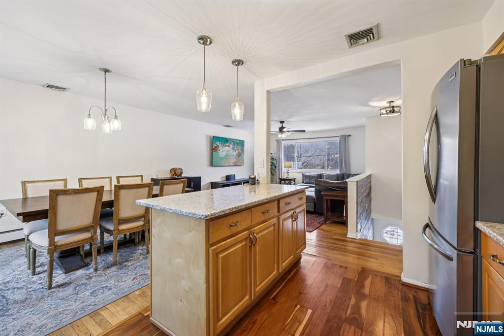 4 Birch Road Ringwood, NJ 07456 - Photo 16 of 41 a large kitchen with kitchen island a large counter top space a sink stainless steel appliances and cabinets