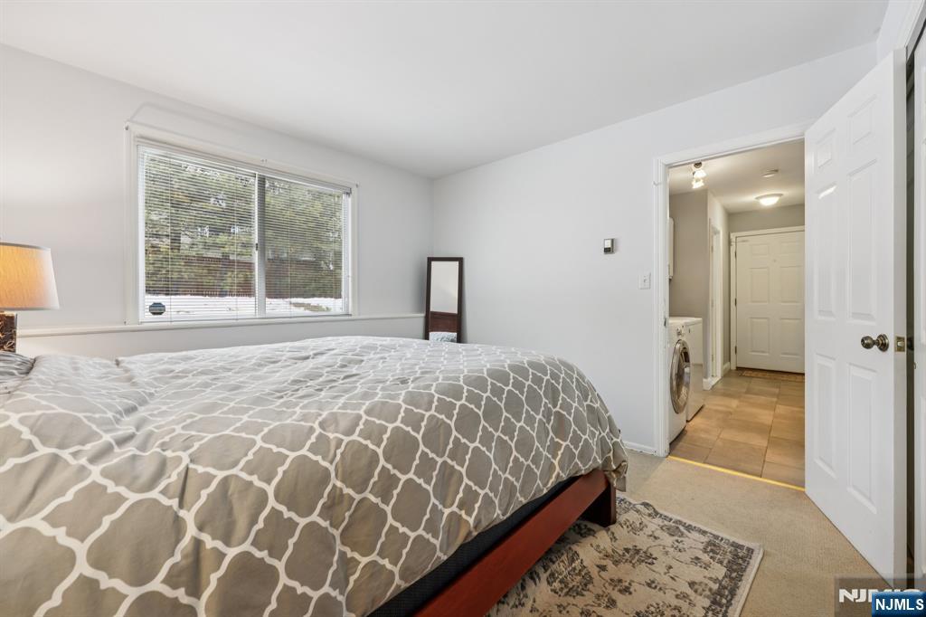 4 Birch Road Ringwood, NJ 07456 - Photo 24 of 41 a bedroom with a bed and a window