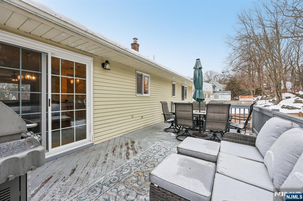 4 Birch Road Ringwood, NJ 07456 - Photo 37 of 41 a view of a patio with a table and chairs