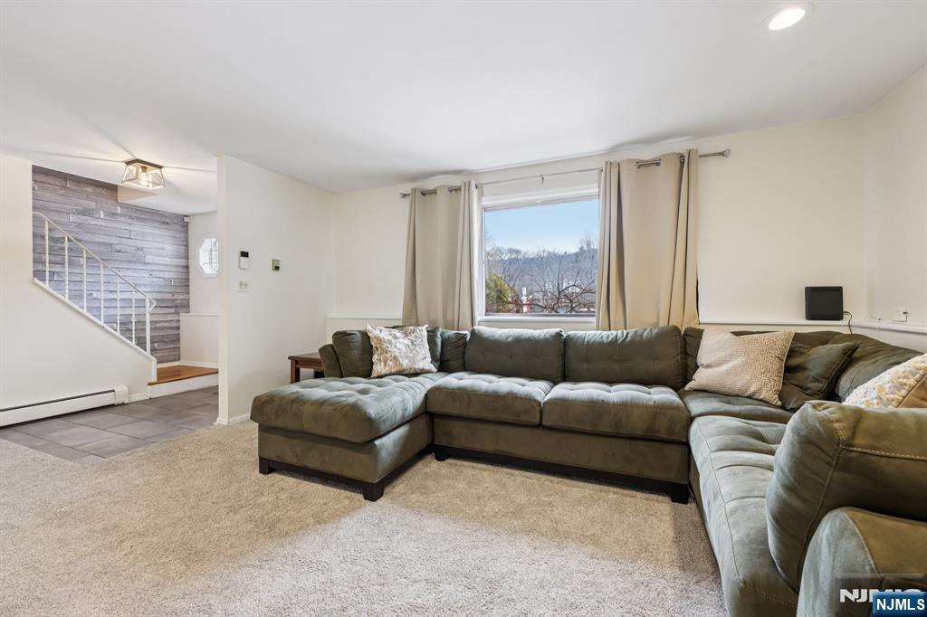 4 Birch Road Ringwood, NJ 07456 - Photo 6 of 41 a living room with furniture and a large window