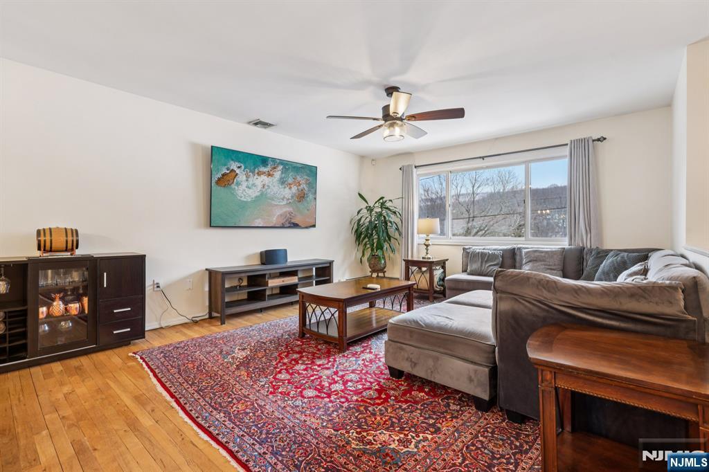 4 Birch Road Ringwood, NJ 07456 - Photo 9 of 41 a living room with furniture and a flat screen tv