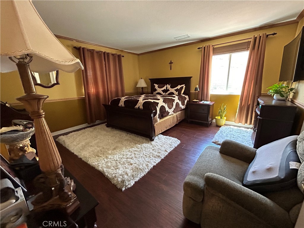 24702 Montevista Circle Valencia, CA 91354 - Photo 13 of 25 a living room with furniture and a flat screen tv