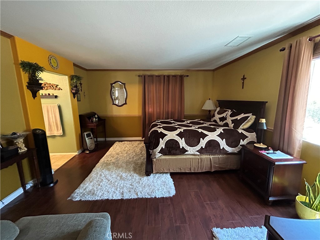 24702 Montevista Circle Valencia, CA 91354 - Photo 18 of 25 a living room with furniture and a flat screen tv
