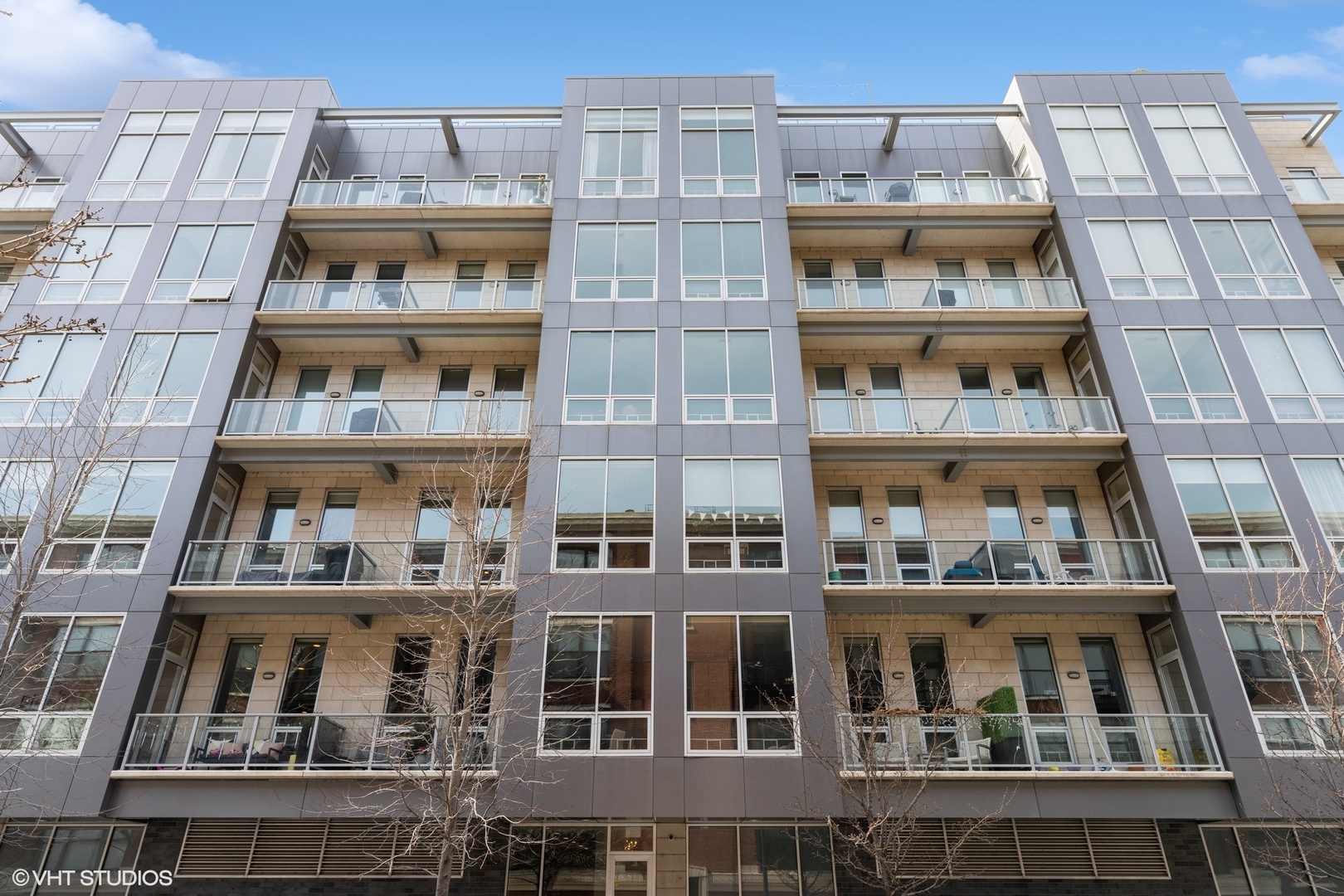 128 South Aberdeen Street, Unit PHN Chicago, IL 60607 - Photo 1 of 43 a front view of a multi story building