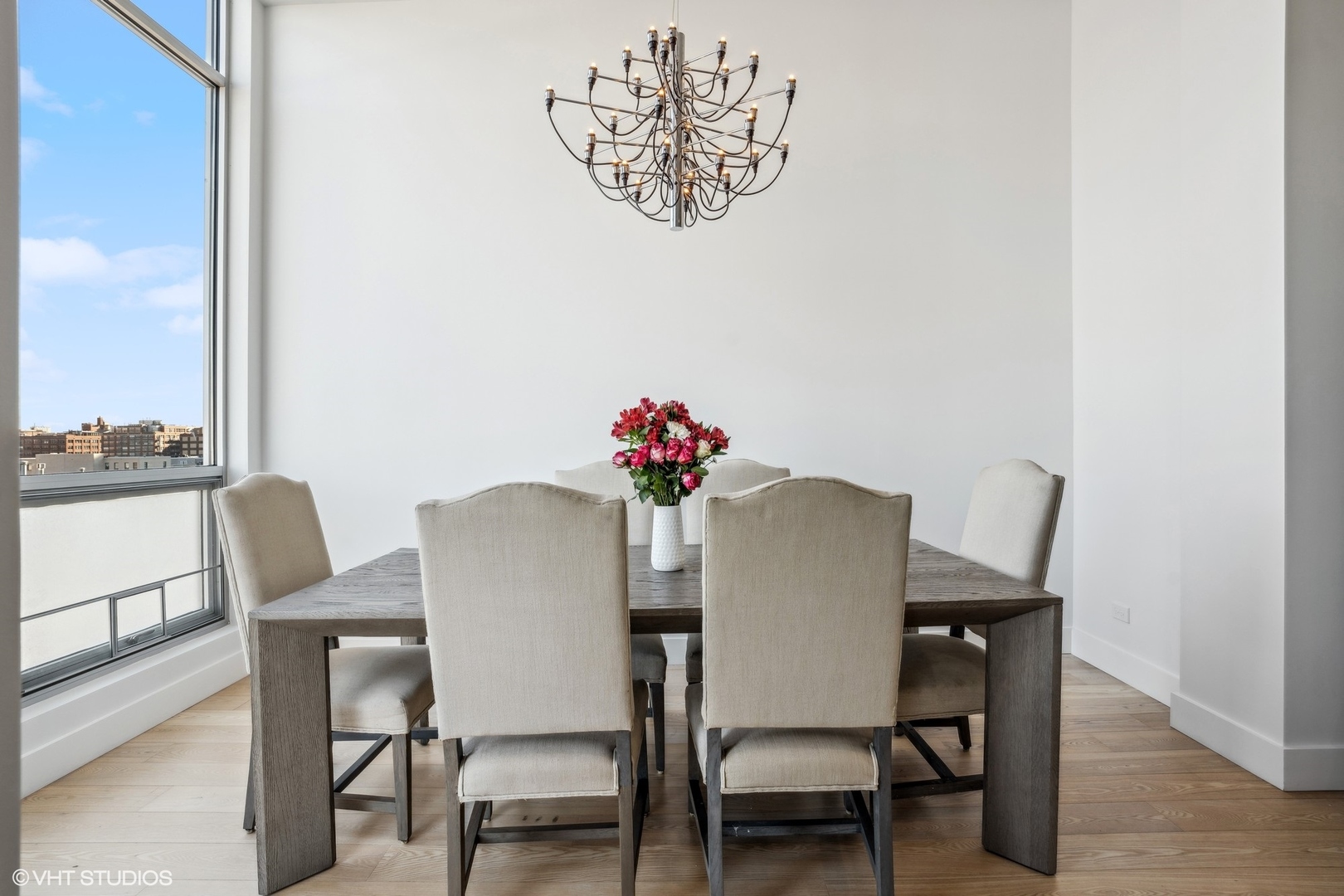 128 South Aberdeen Street, Unit PHN Chicago, IL 60607 - Photo 15 of 43 a dining room with furniture and wooden floor