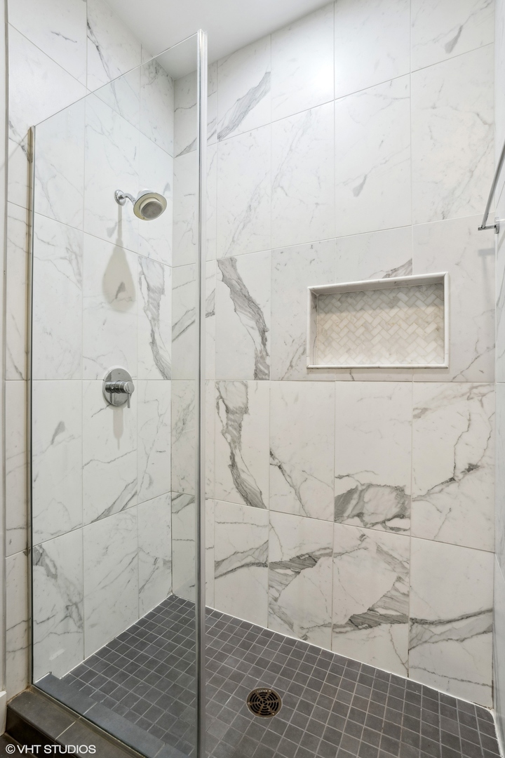 128 South Aberdeen Street, Unit PHN Chicago, IL 60607 - Photo 22 of 43 a bathroom with a shower