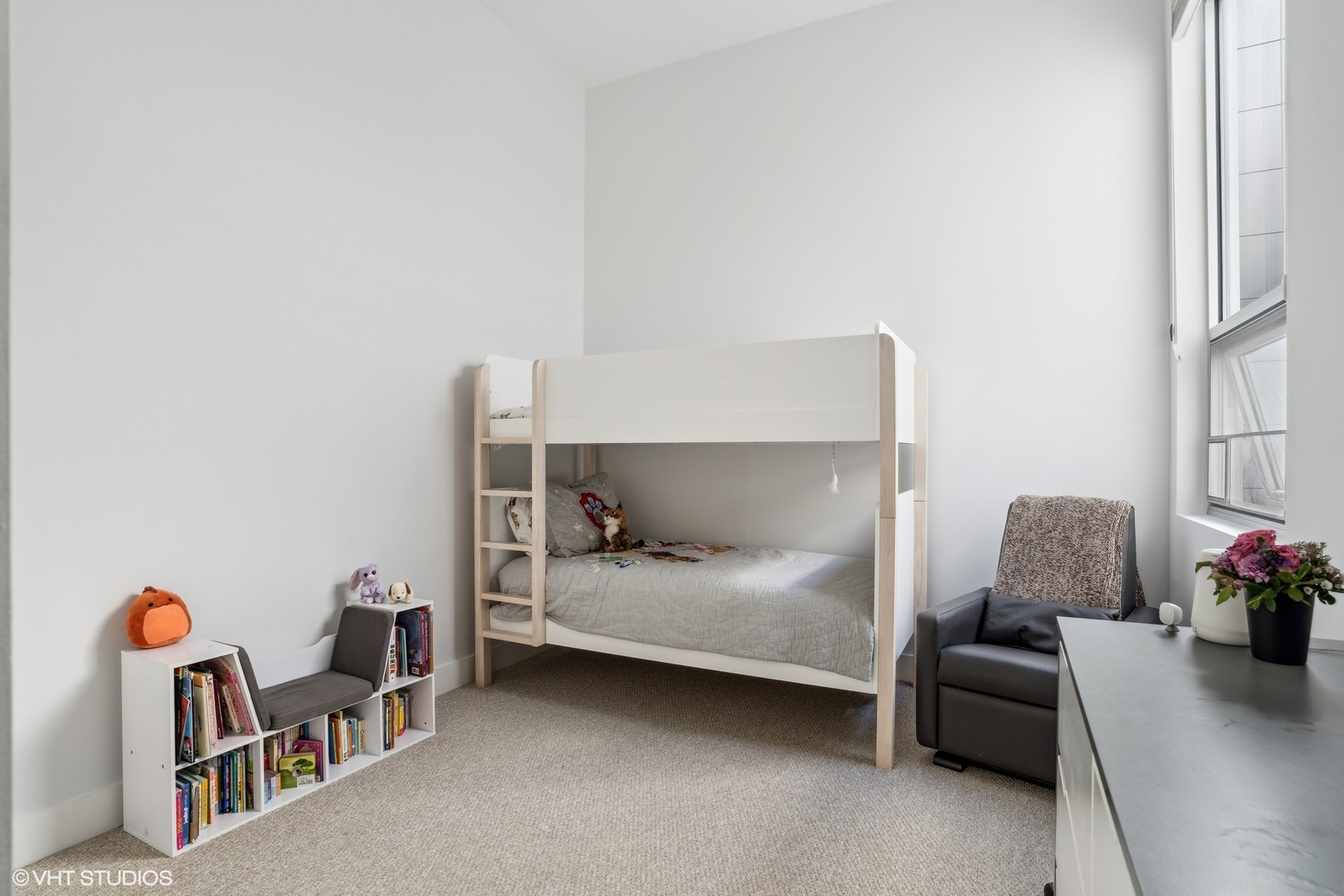 128 South Aberdeen Street, Unit PHN Chicago, IL 60607 - Photo 24 of 43 a bedroom with furniture and a window