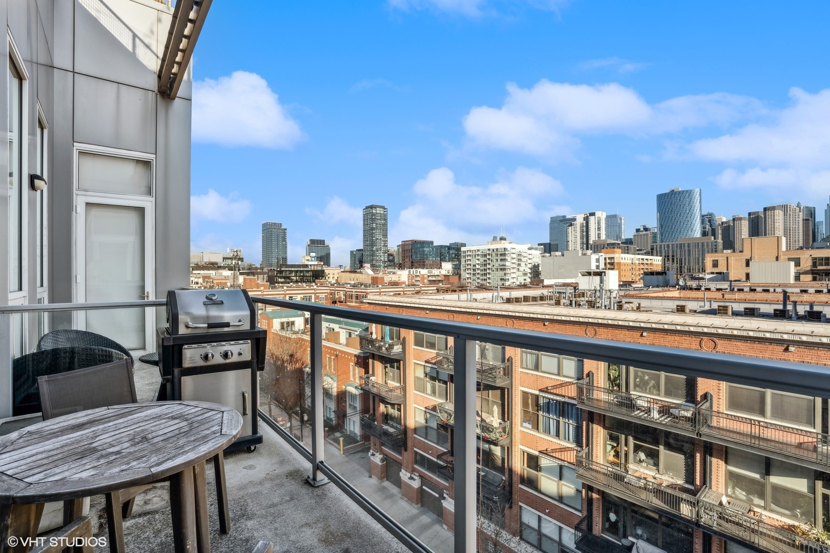 128 South Aberdeen Street, Unit PHN Chicago, IL 60607 - Photo 28 of 43 a view of a balcony with furniture