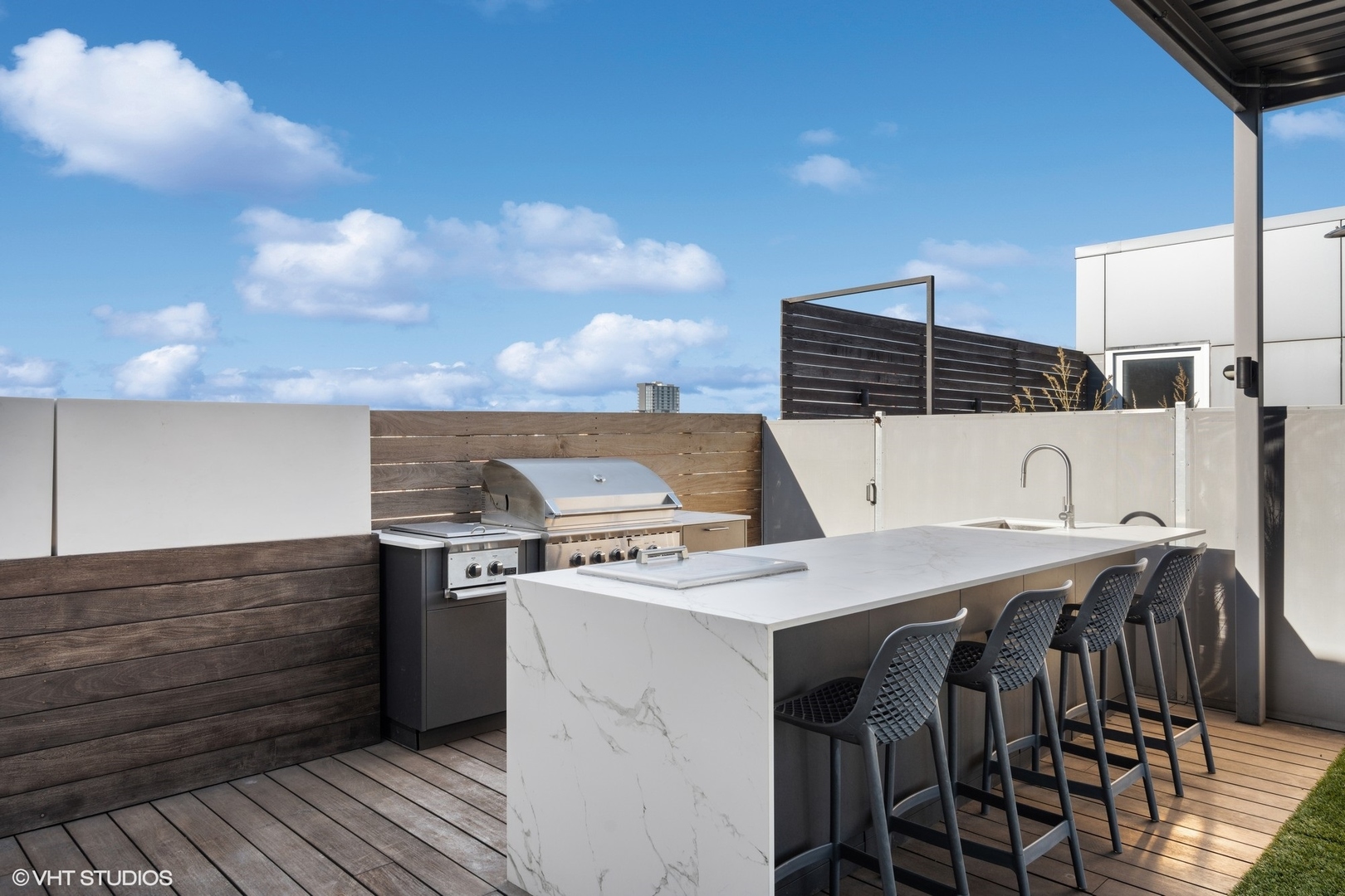 128 South Aberdeen Street, Unit PHN Chicago, IL 60607 - Photo 33 of 43 a view of dinning table and chairs in balcony