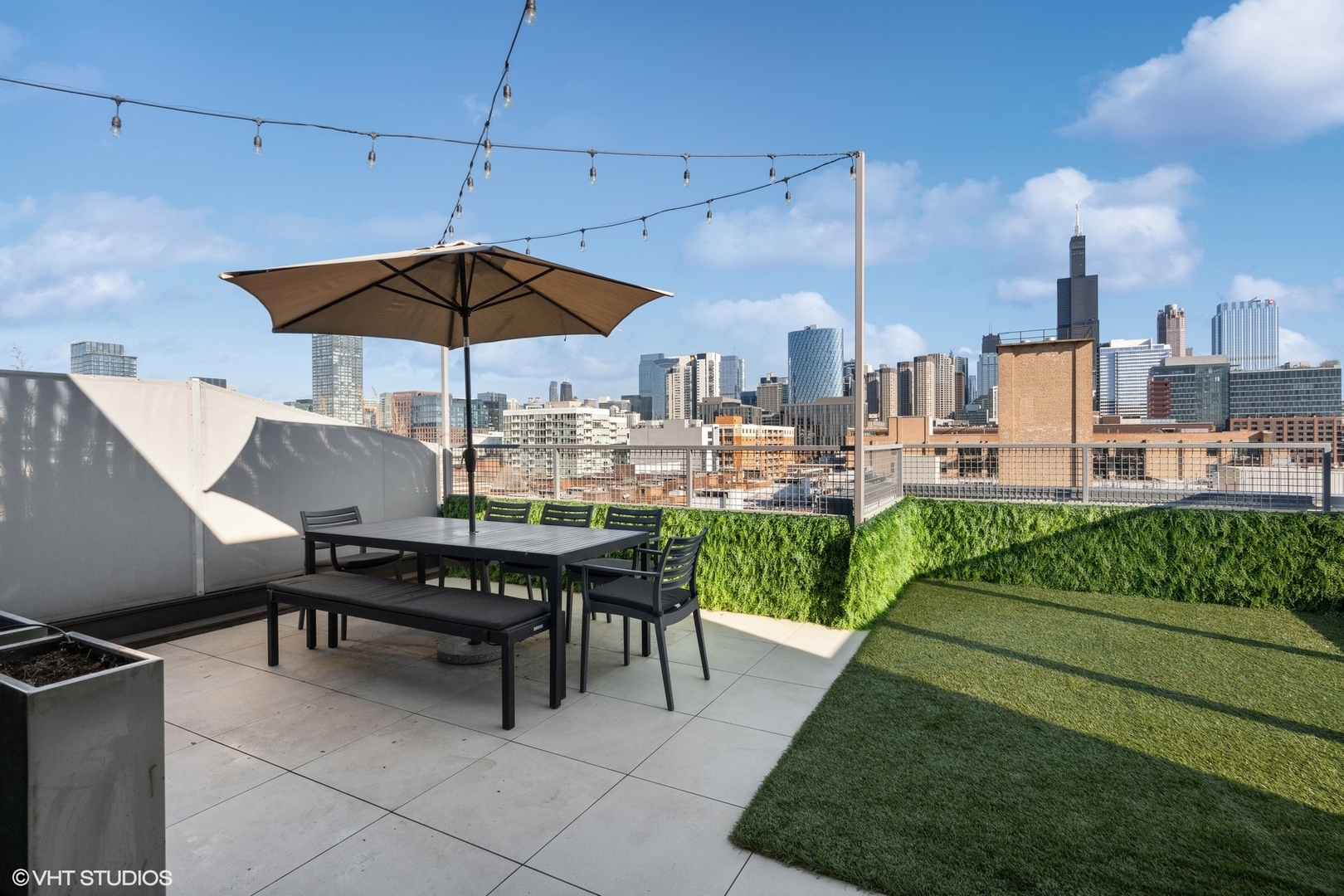 128 South Aberdeen Street, Unit PHN Chicago, IL 60607 - Photo 39 of 43 a view of a terrace with sitting area