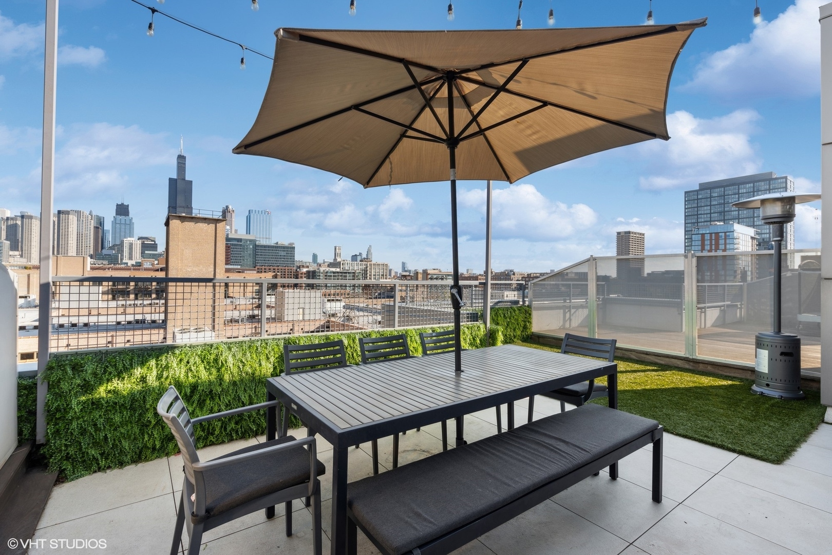 128 South Aberdeen Street, Unit PHN Chicago, IL 60607 - Photo 42 of 43 a view of a roof deck with furniture and a yard