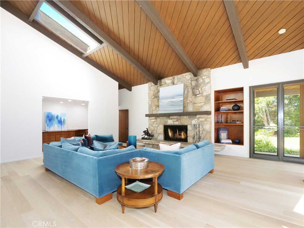 57 Saddleback Road Rolling Hills, CA 90274 - Photo 15 of 38 a living room with furniture and a fireplace