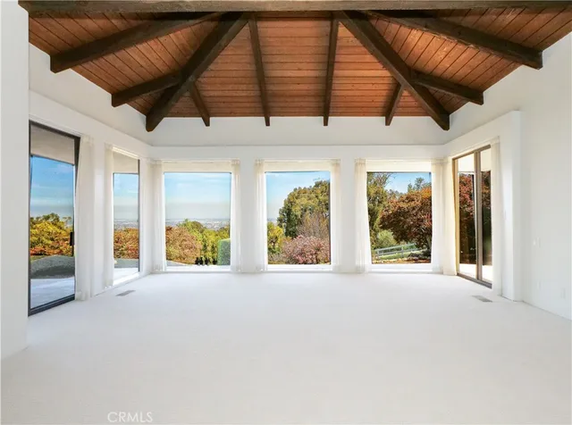 a view of a livingroom with a patio and a couch