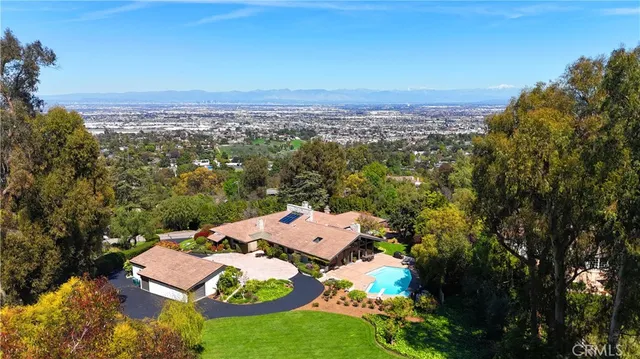 an aerial view of residential house with outdoor space