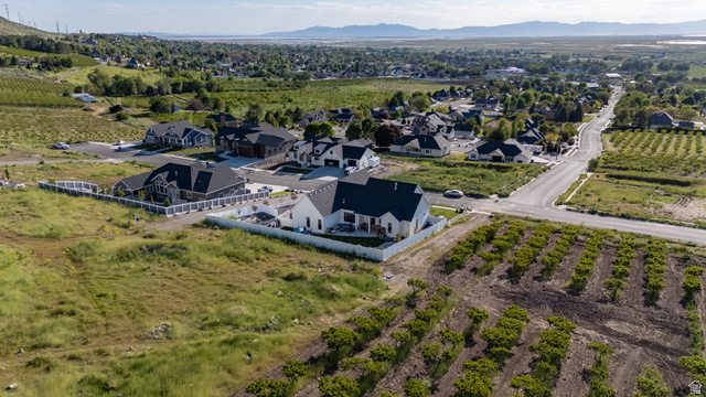 2013 South 100 West Perry, UT 84302 - Photo 45 of 49 Aerial perspective showcasing a residential neighborhood with a distant mountain backdrop