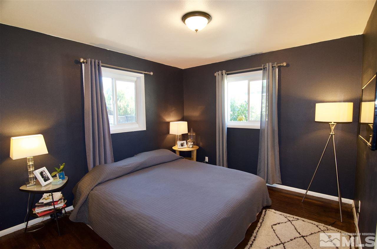 445 Ballentyne Way Reno, NV 89502 - Photo 11 of 25 a bedroom with a bed and window