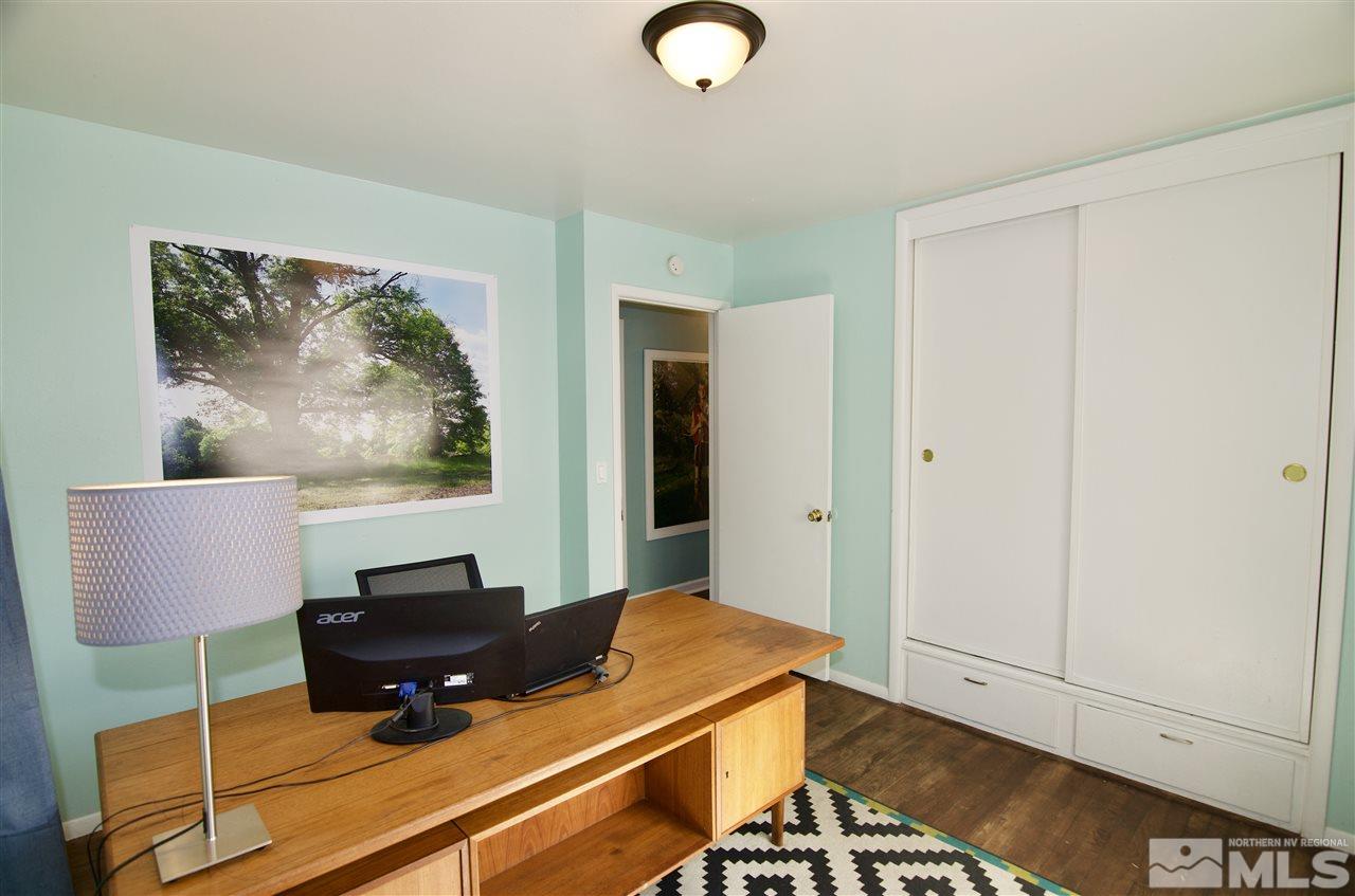 445 Ballentyne Way Reno, NV 89502 - Photo 17 of 25 a room with furniture and wooden floor