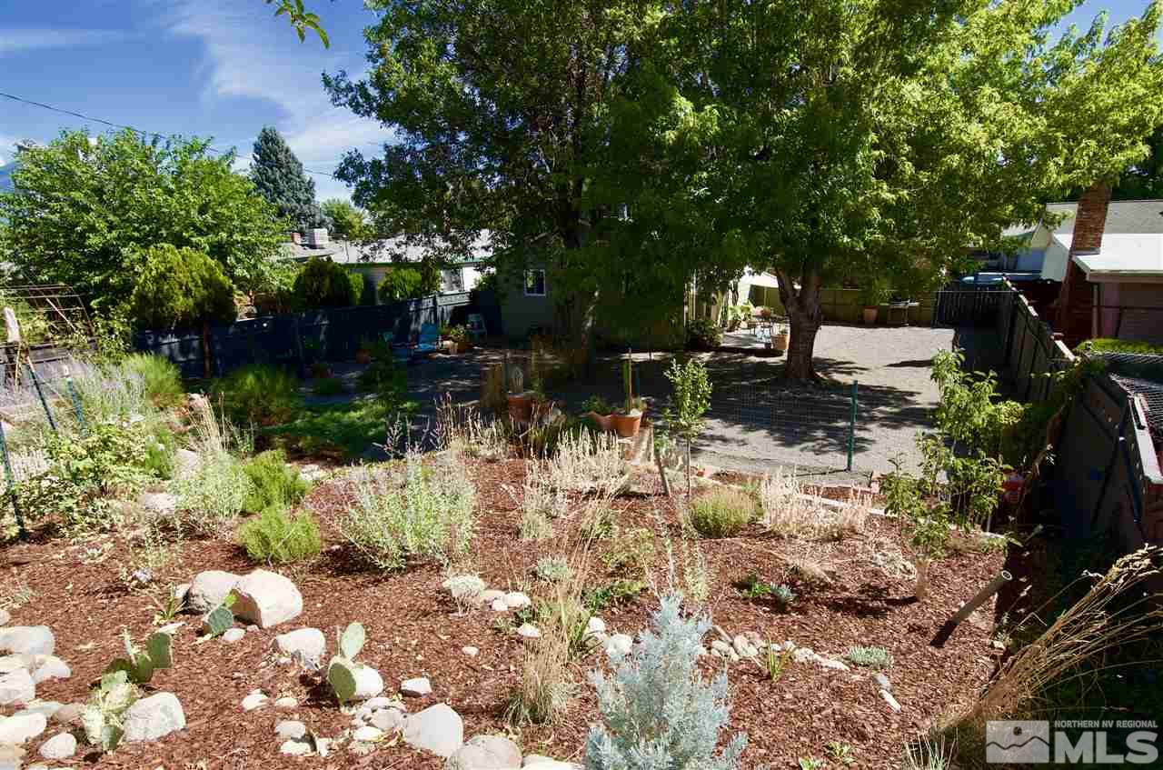 445 Ballentyne Way Reno, NV 89502 - Photo 4 of 25 a view of yard with green space