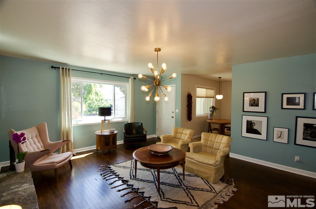 445 Ballentyne Way Reno, NV 89502 - Photo 7 of 25 a living room with furniture and a large window