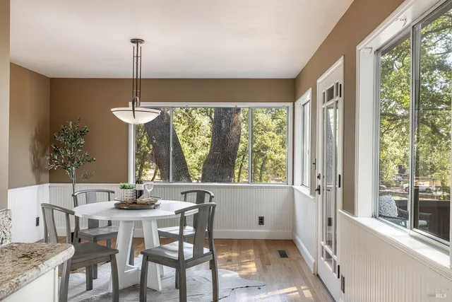 a bedroom with furniture and windows