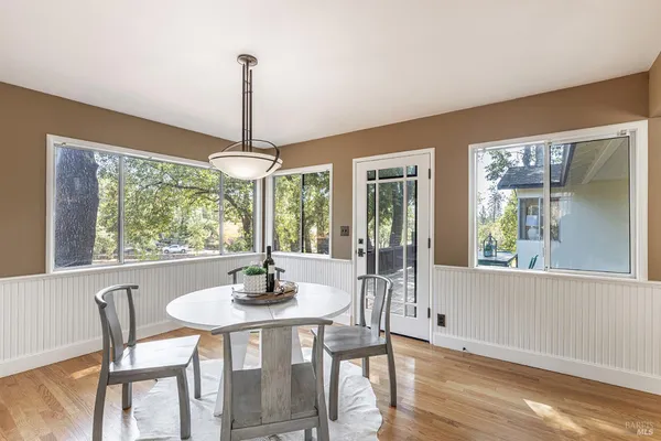 a bedroom with a bed and cabinets