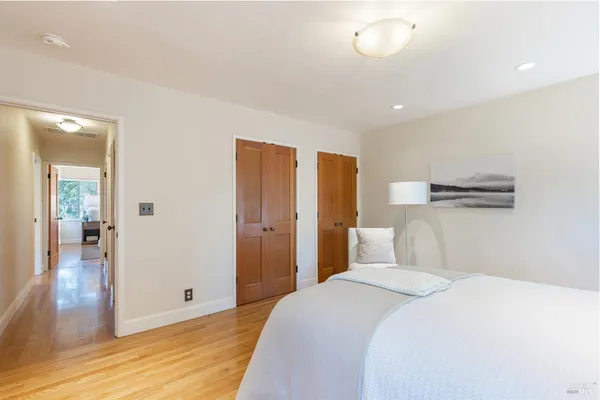 a bathroom with a sink a mirror and shower